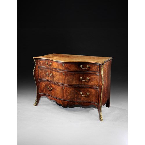 A George III period mahogany serpentine commode Attributed to Henry Hill of Marlborough